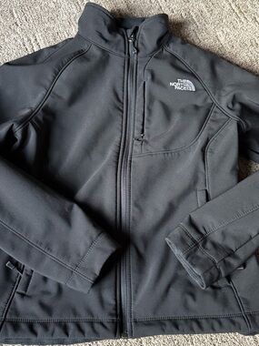 The North Face Black Jacket with Logo Tag